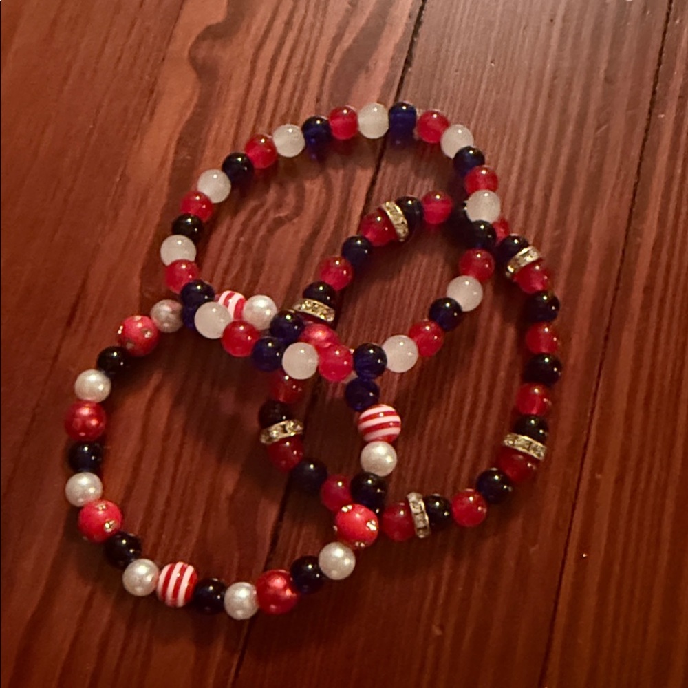 Red, Blue, and White Beaded Bracelets